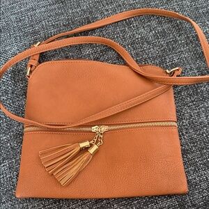 Elegant Tan Crossbody Bag with Tassel